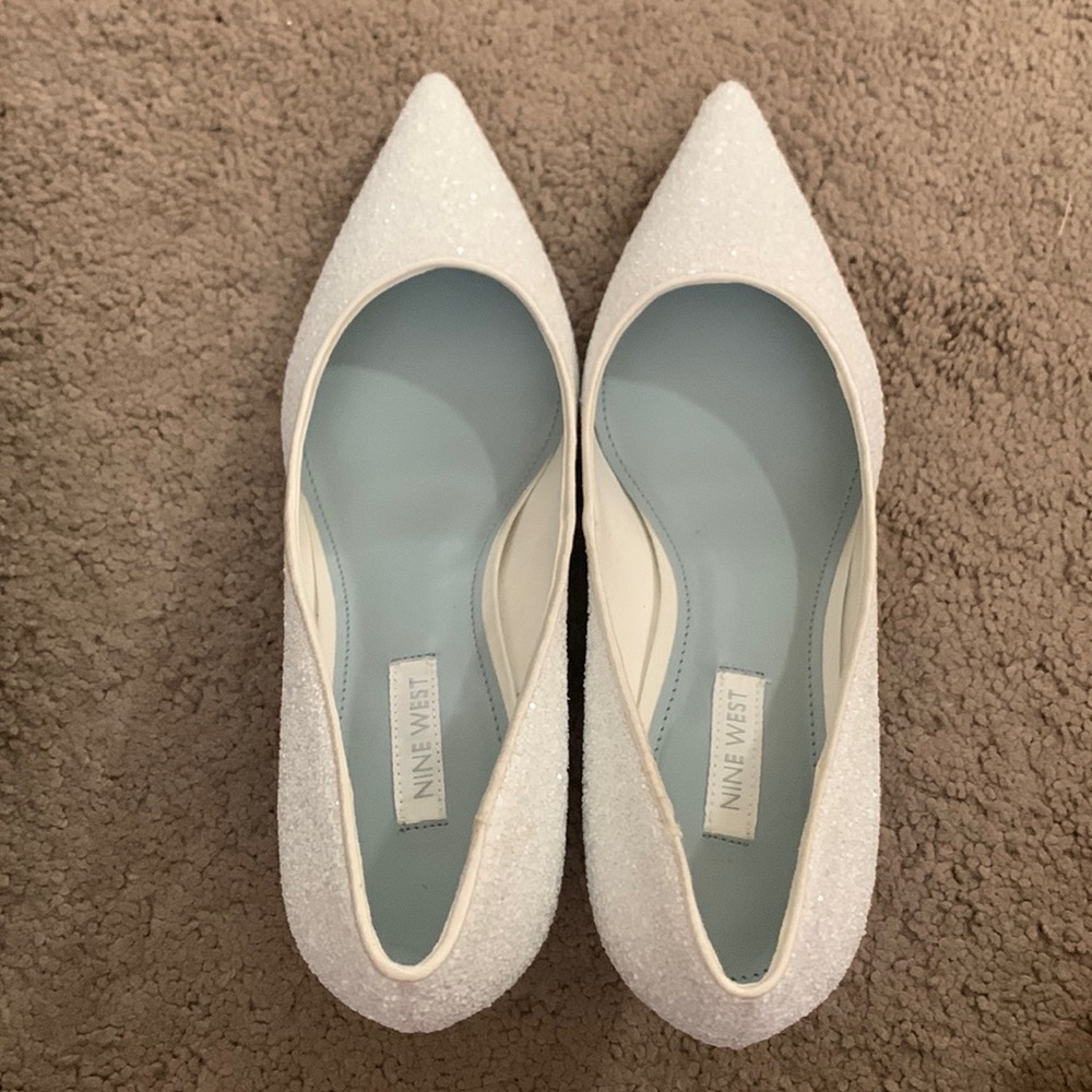 Brand new Nine West Arlene pump with glitters.